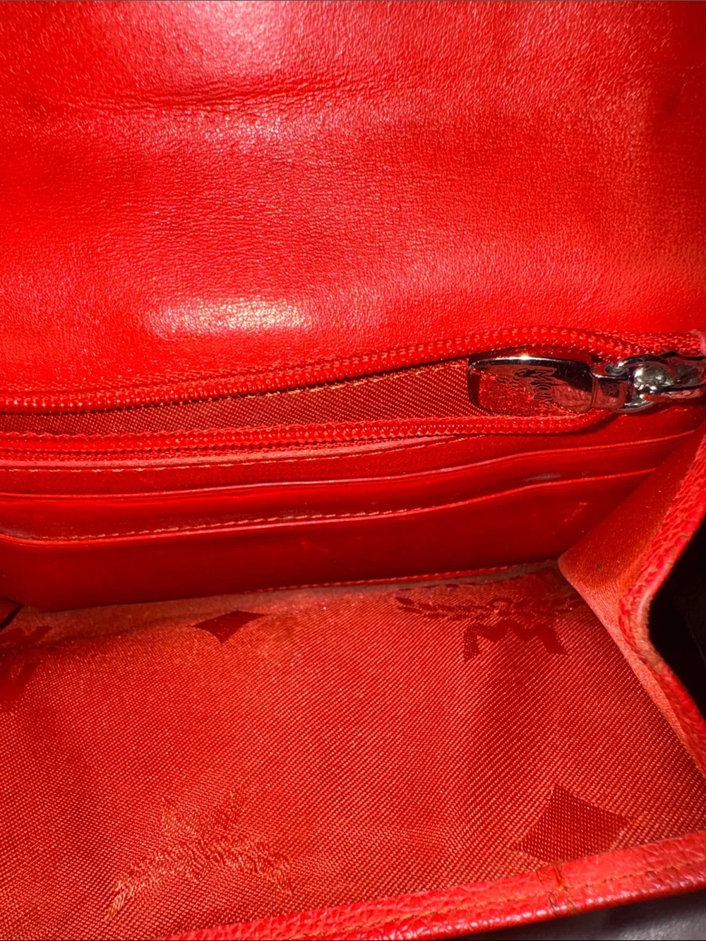 MCM Red Pebbled Leather Fold-Over Wallet.